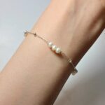 دستبند مروارید پرورشی و گوی نقره