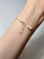 دستبند مروارید پرورشی و گوی نقره - Image 2